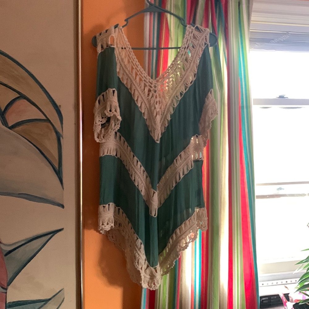 This shirt is one of my favs. Wear it with a cami or over a bathing suit
